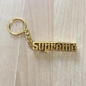 Supreme Gold Grand Prix Keychain
